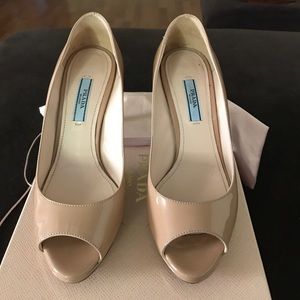 Prada peep toe pumps in nude