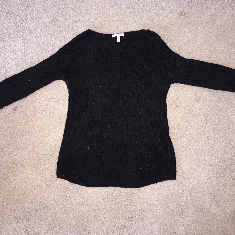 delia’s black sweater