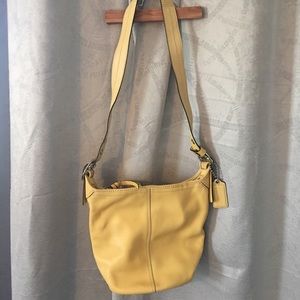 Coach. Yellow bucket purse