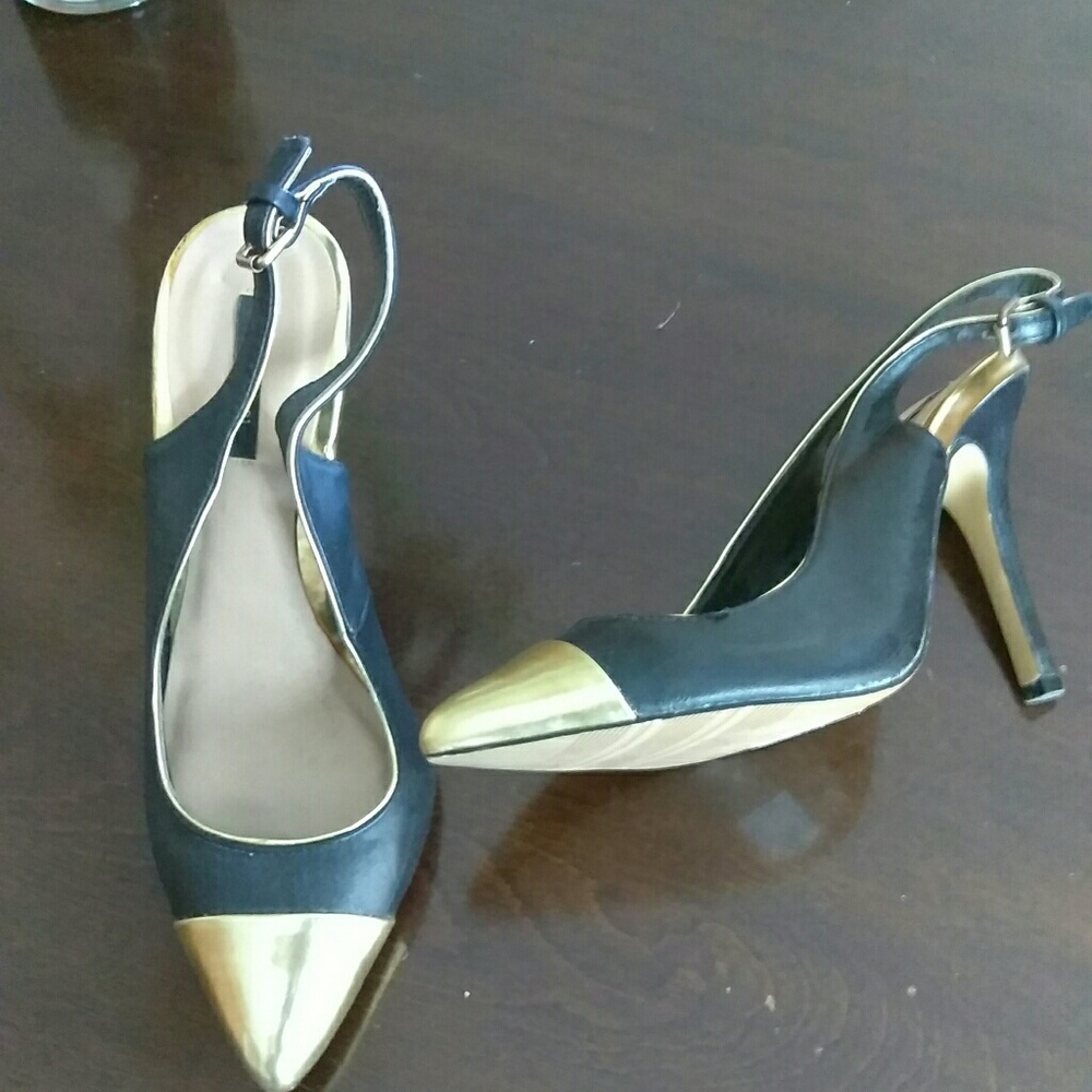 Black heel with gold plated toe