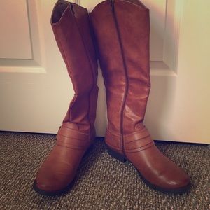 Tall light brown riding boots!