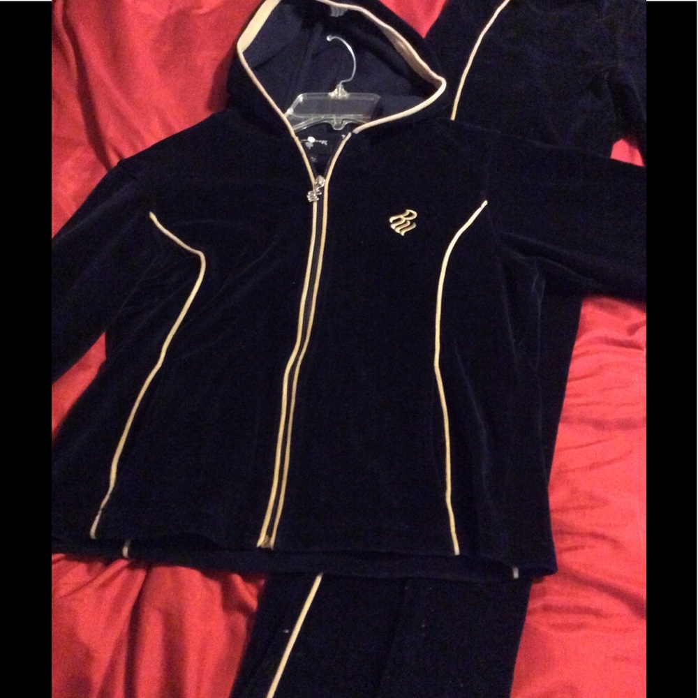 Navy bluw/tan Roca wear velour track suit.
