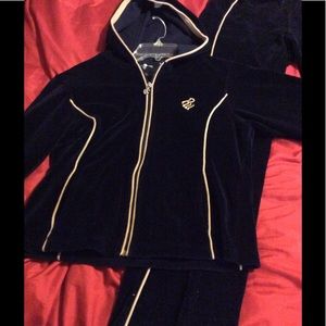 Navy bluw/tan Roca wear velour track suit.