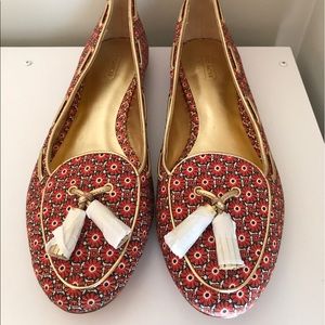 Coach orange and gold print tassel flats sz 10