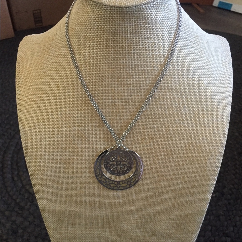 Silver cut out circle medallion statement necklace