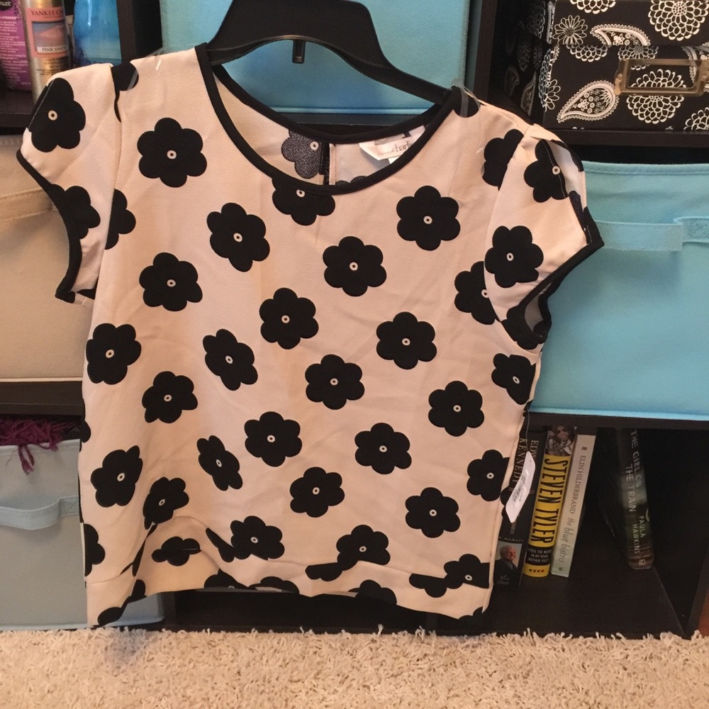 Cap sleeved shirt, open in back, tags still on