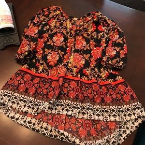 Festive cold shoulder top or dress.