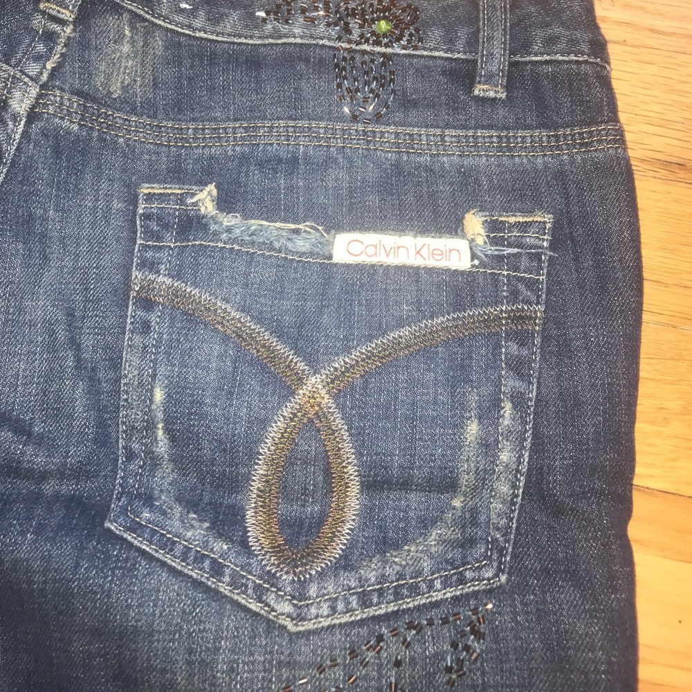 Calvin Klein distressed low cut jeans
