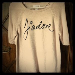 Elle J'adore short sleeve sweater.