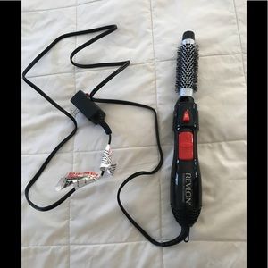 Curling brush iron with manual rotation button
