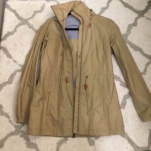 Columbia rain jacket in khaki.