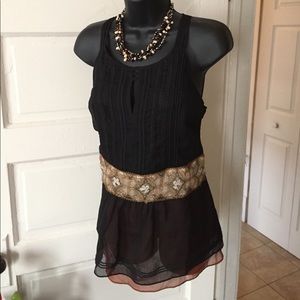 NWT women's size M black top. Sexy brown accents