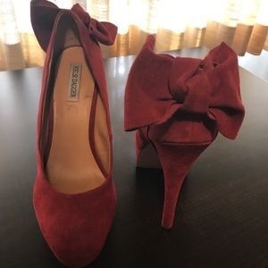 Red suede platform heels with removable bows