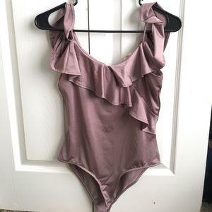 NWT Mauve Ruffle Bodysuit!
