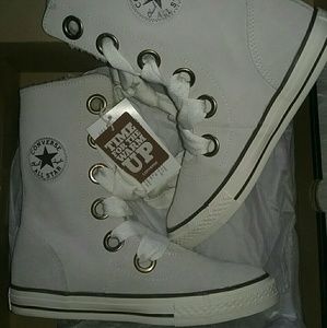 NIB Converse high-tops with sherpa lining.