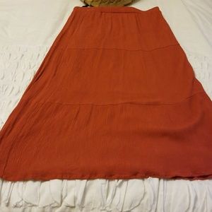 Mid length Burnt orange skirt