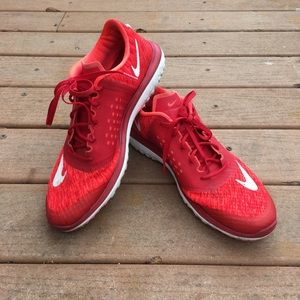 Red Nike men's running shoes