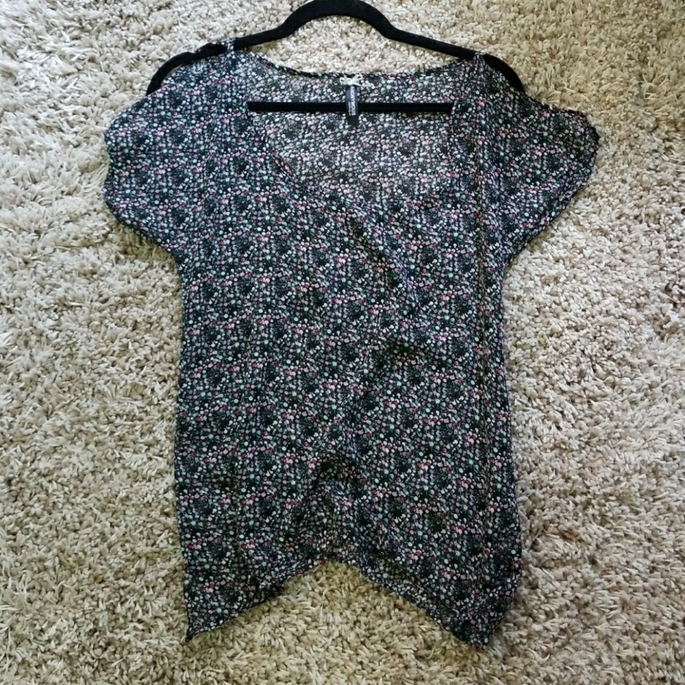 Floral patterned sheer top with shoulder holes
