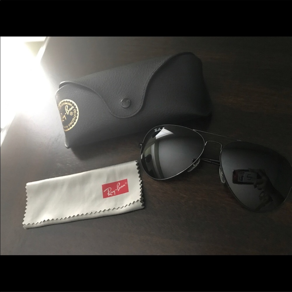 All black Ray Ban Aviators
