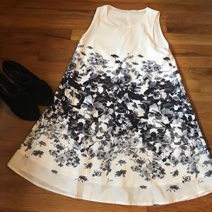 White dress with navy flower design
