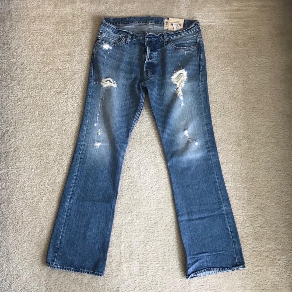 Men’s Hollister denim, low rise slim boot med wash