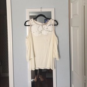 Cold Shoulder top with floral appliqué