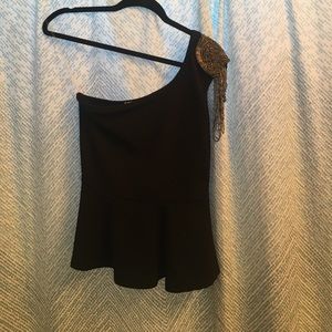 Black going out top