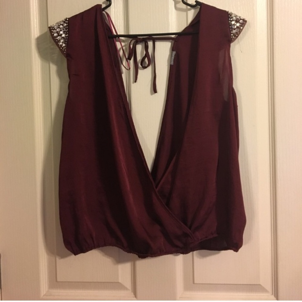 Deep plunging neck top