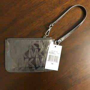 Brand new with tags silver Michael Kors wristlet