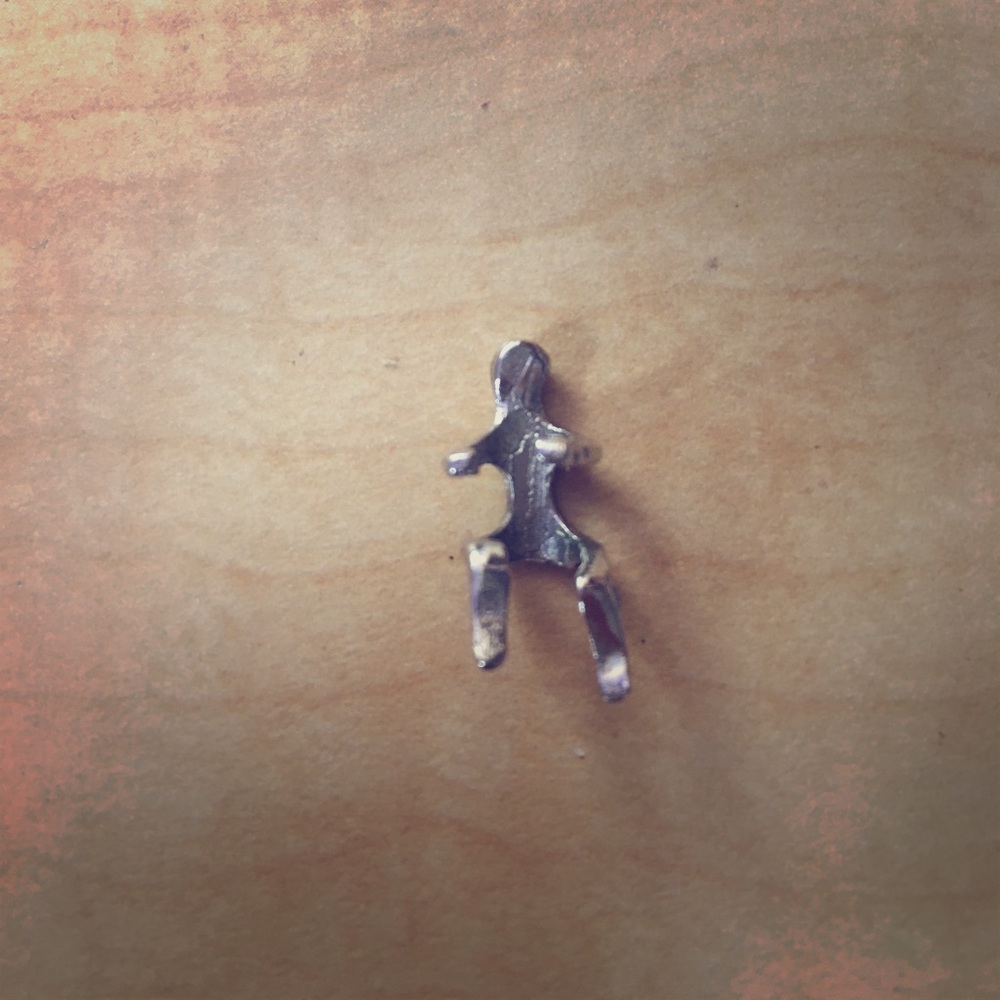 Silver person cuff