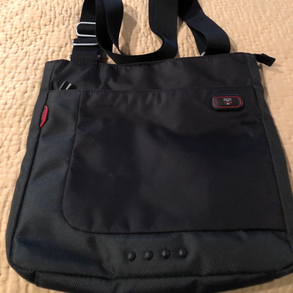 Tumi messenger bag cross body style