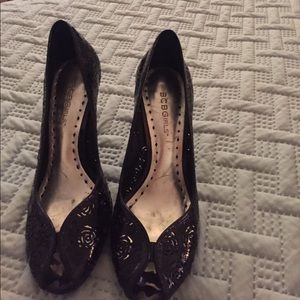 Black patent material peep toe heel