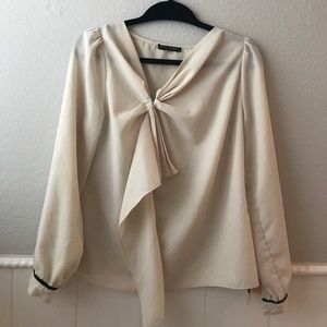 Cream and black blouse