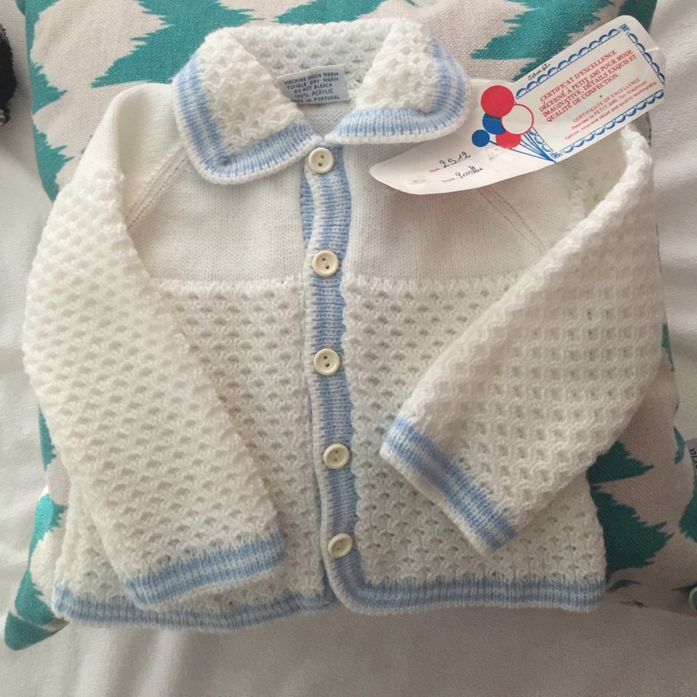 Brand new hand knitted baby sweater