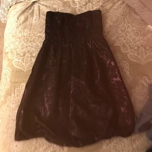 Cute back and purple bubble dress.