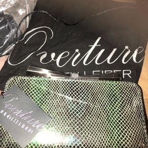 Judith Leiber clutch.