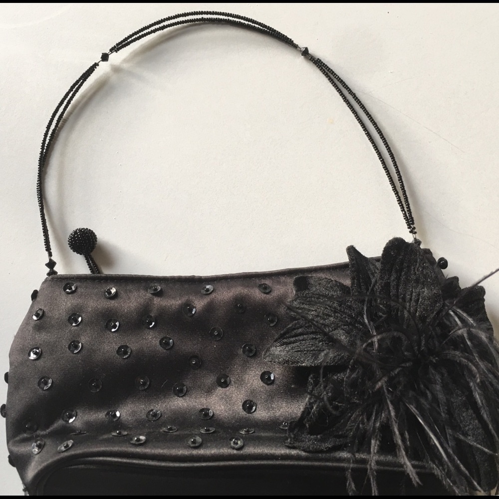 Black evening bag. Sequins, beads, feathers cute