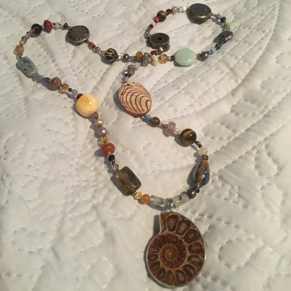 Beaded necklace with ammonite.