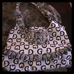 Cream handbag with lizard and meta detailing
