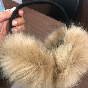 Oversized brown earmuffs