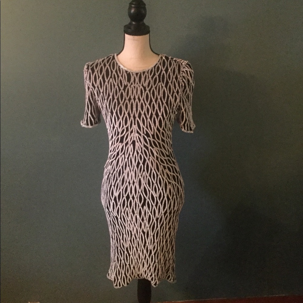 Black dress with a white sequenced pattern