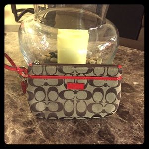 Coach wristlet classic C with red patent leather