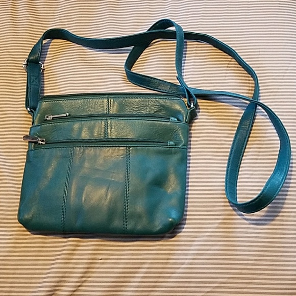 Handbags - NWOT. Teal faux leather cross body bag