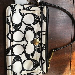 Black and white coach wristlet