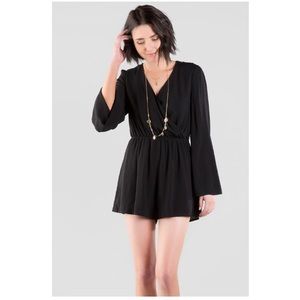 Lace back black long sleeve romper