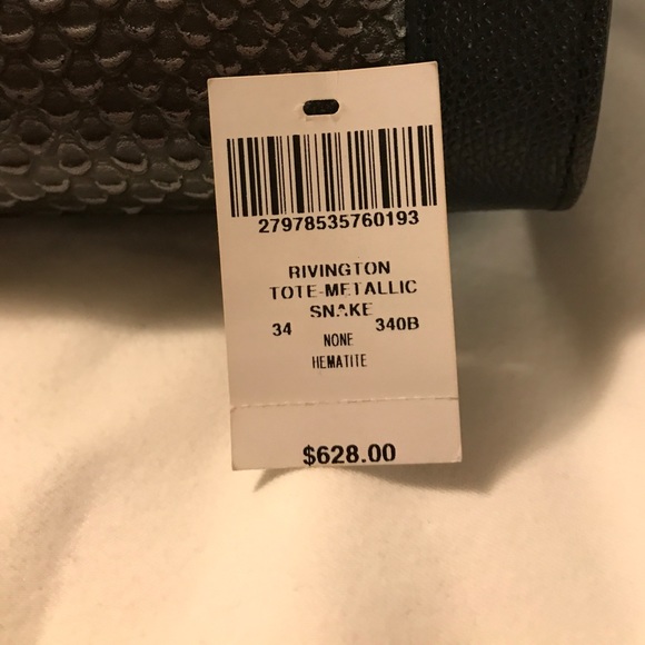 Henri Bendel – Black and Metallic Snake Colors.