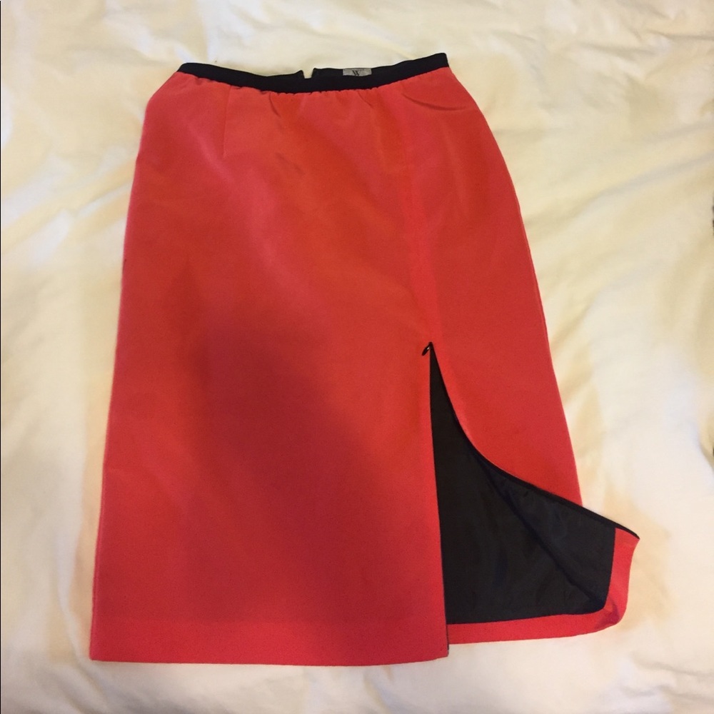 Pencil skirt with zipper slit