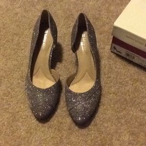 One time used glitter pumps.
