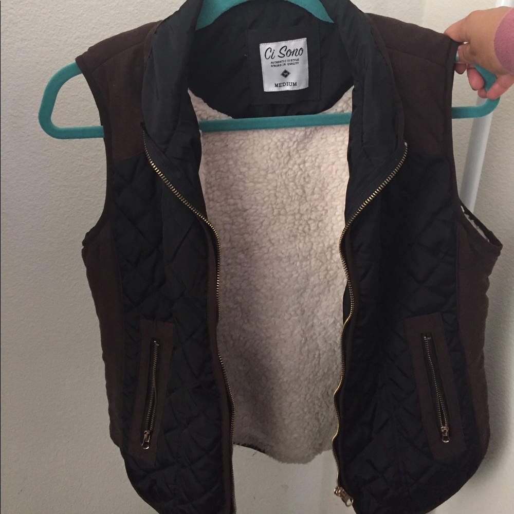 Quilted vest with gold accents! ☃️