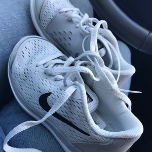 Brand new KIDS Nike shoes. No longer fit my kids